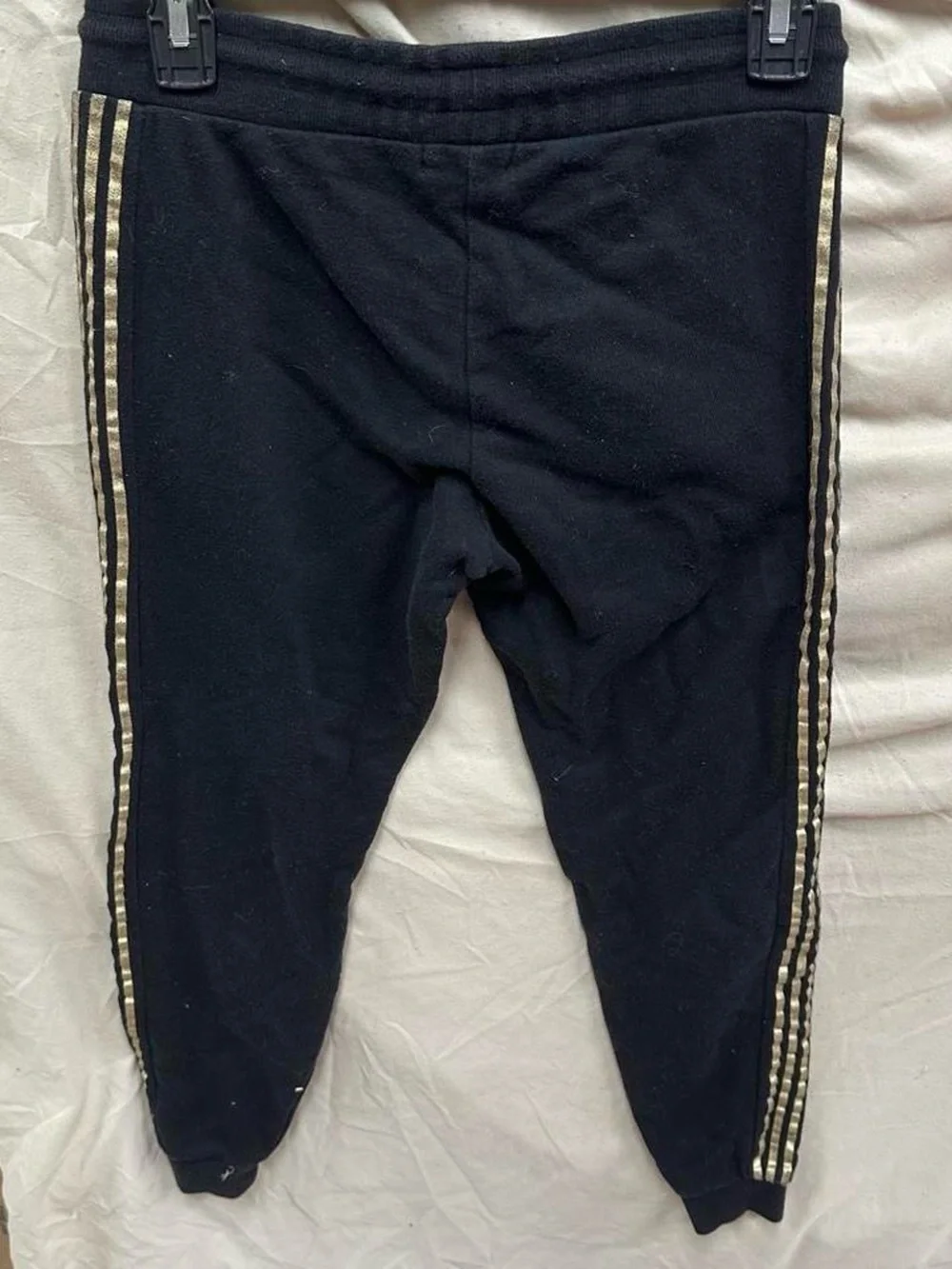 GUESS black and gold with rhinestones sweat pants.